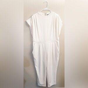 Woman’s white jumpsuit